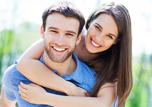 young couple with great smiles