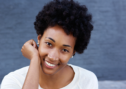 young woman with straight smile